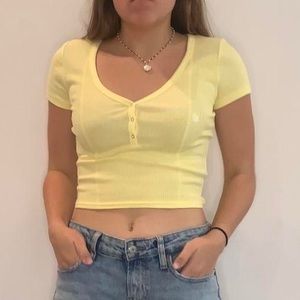 yellow tee shirt PacSun/Me to We short sleeve pastel crop top, button